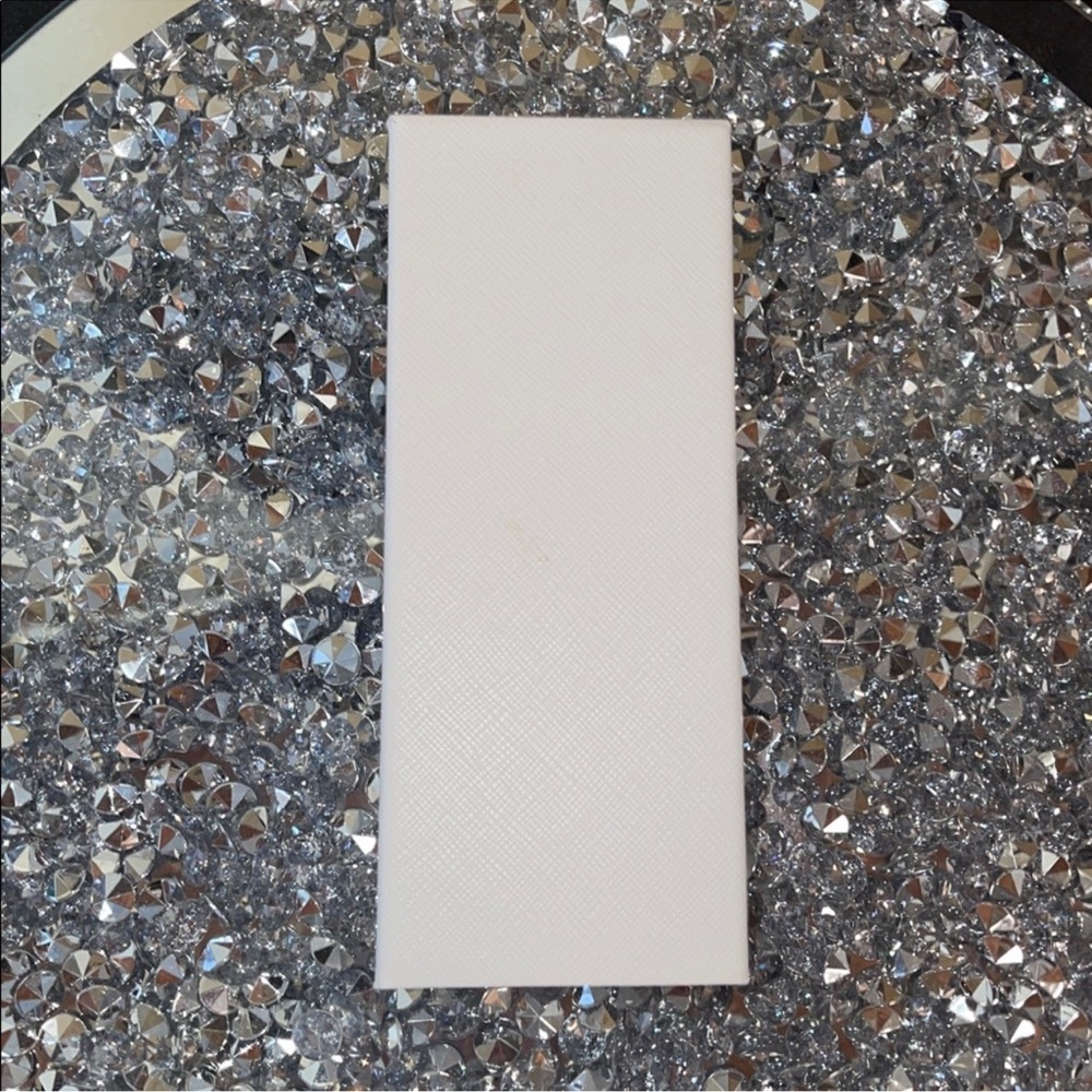 White Leather Sunglasses Case W/ New In Plastic Wipey + Card
Prada
$85 - Picture 6 of 6